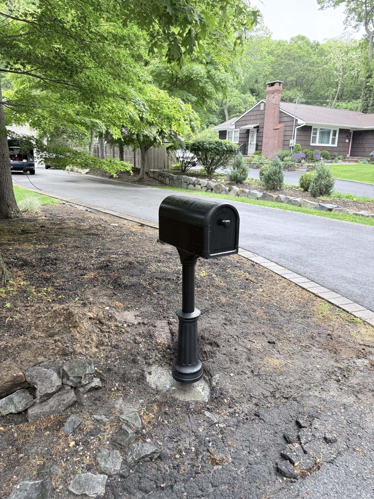 Finished porch swing and mailbox installation