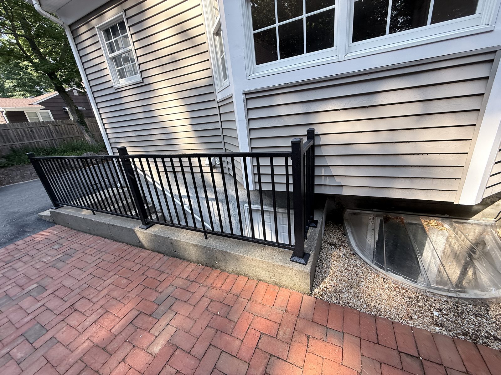 Finished black metal exterior railing